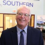 Dr. Corley Dennison