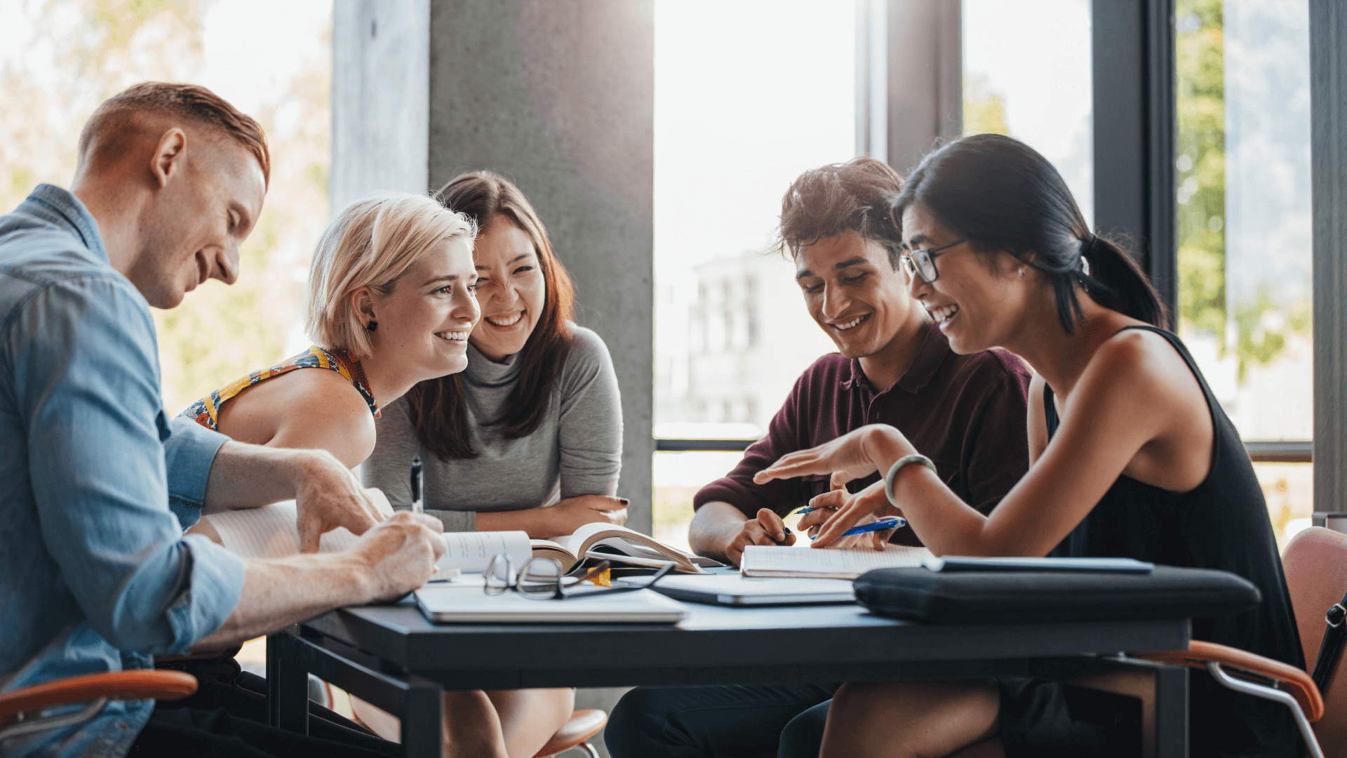 students talking together at table